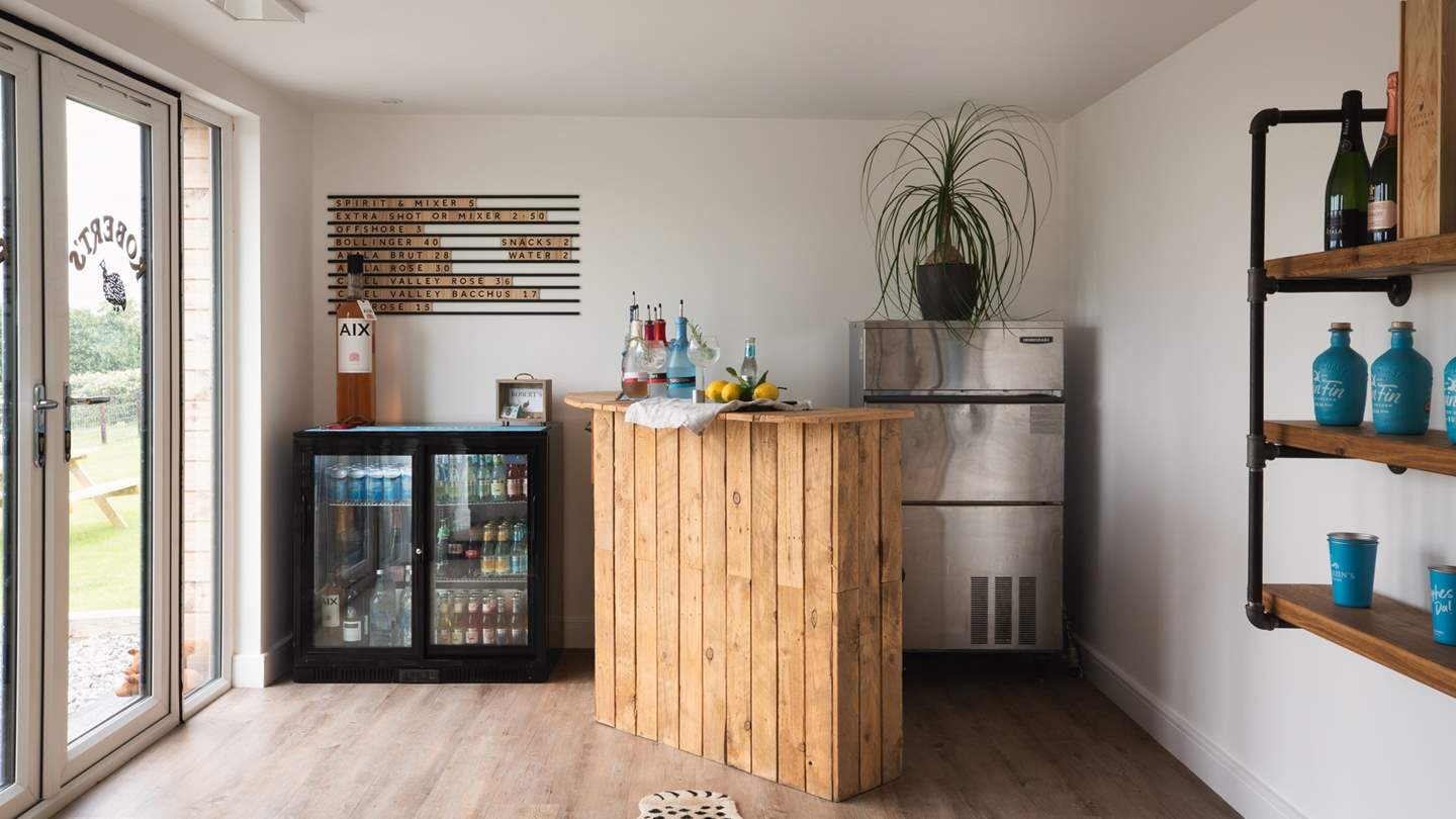 The bar stocks a range of Tarquin's Cornish gins, wine by the bottle or a cold can of Sharps Offshore