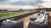 Lounge poolside or take decadent dips, before heading onto the decking area outside to savour far-reaching views across rolling countryside scenes