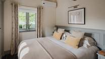 Sweet bedroom three features a zip and link bed that can be made in to a super-king size or twin beds