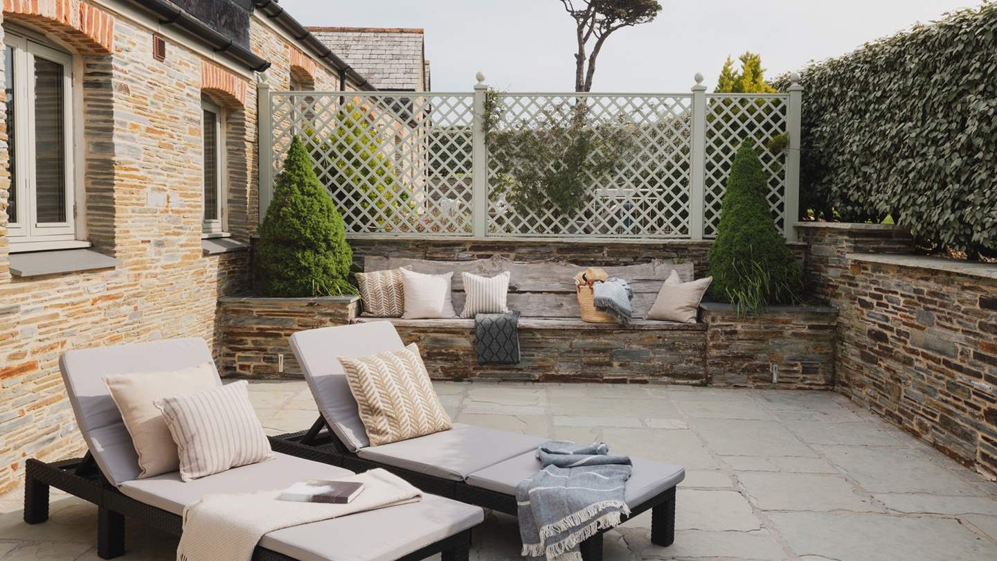 The patio is the perfect retreat for a spot of sunbathing on summer days