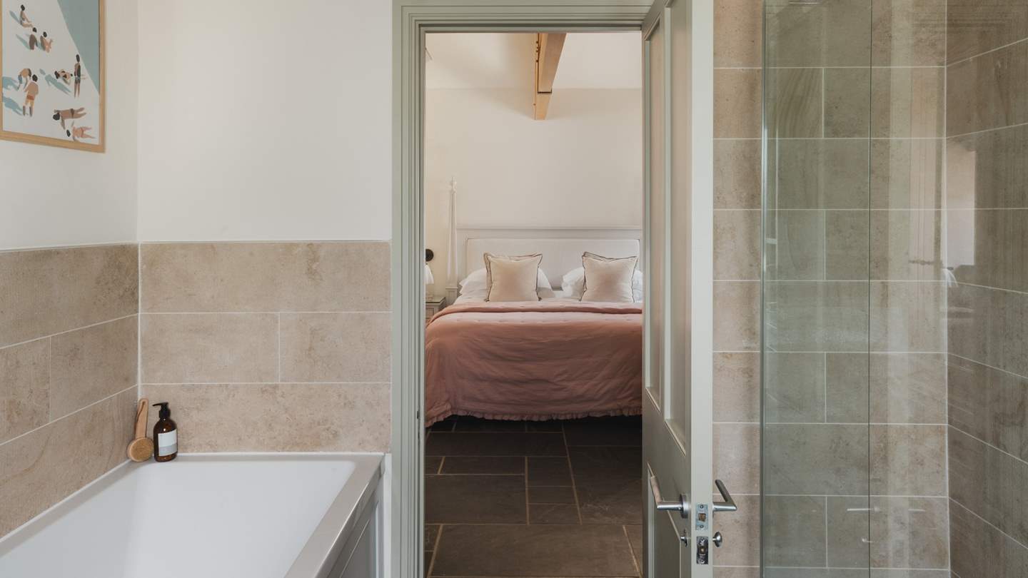 This bedroom benefits from an en suite bath and shower
