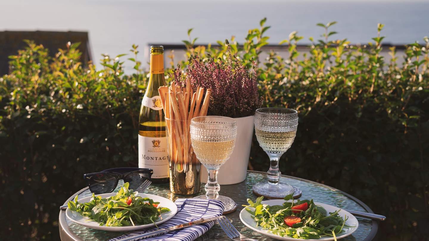 You'll struggle to pay attention to anything except the stunning sea views from the decking area at Sealight, except maybe your glass of sparkle...