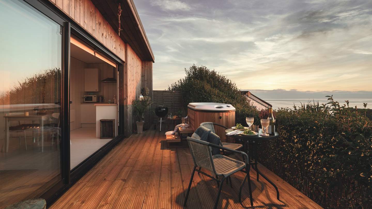 How perfectly dreamy is this twilight dinner for two? Daydream with your loved one until it's time for stargazing from the hot tub.