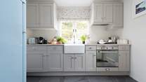 The shaker-style kitchen has everything you could need to rustle up a locally-sourced feast... 