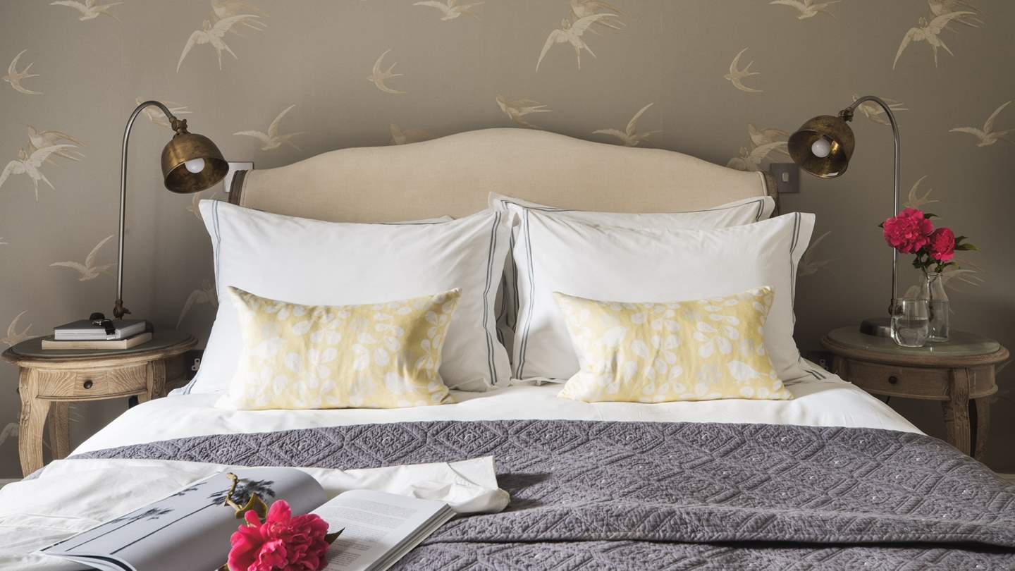 We just love the brass bedside lights