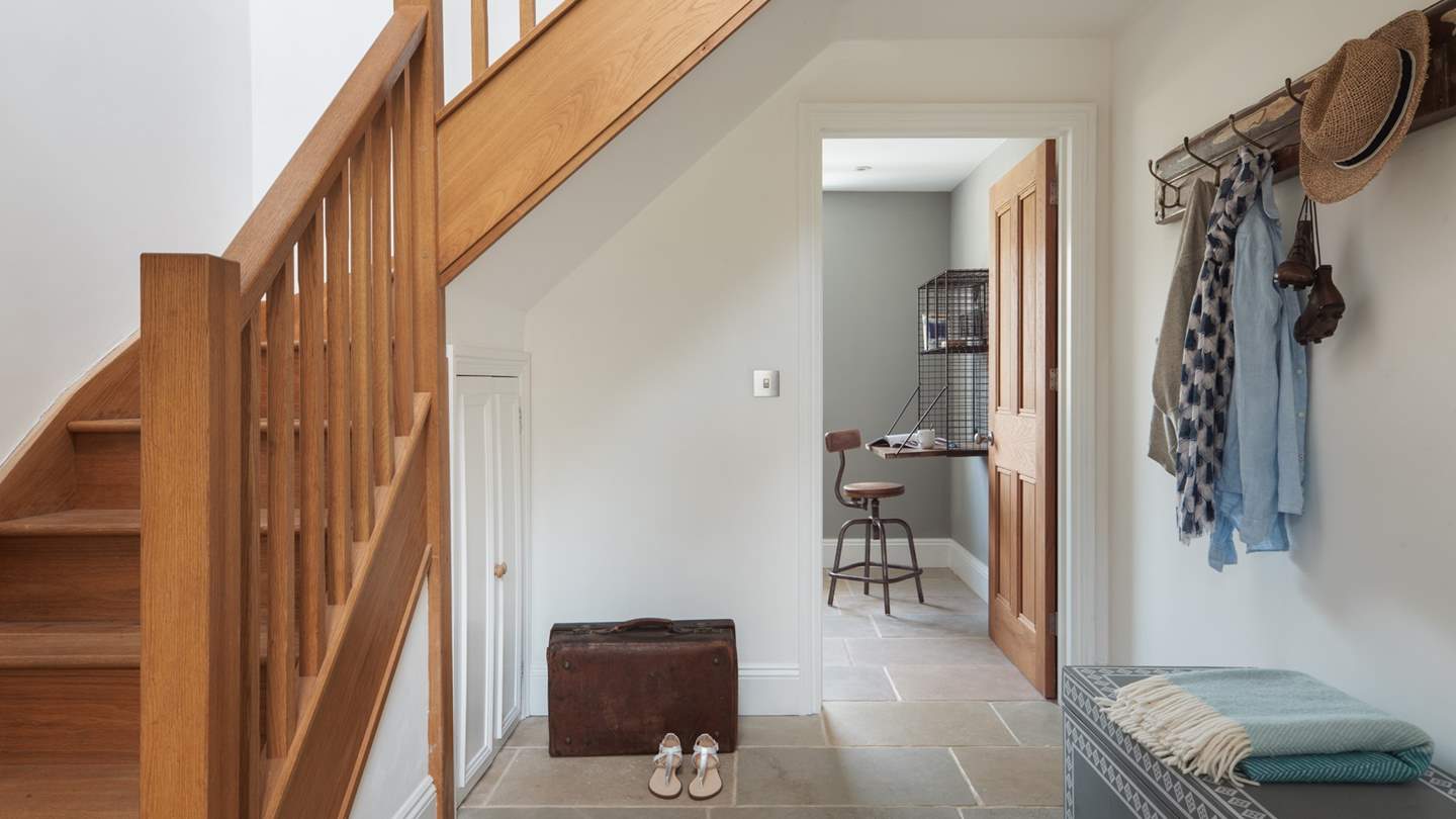 The hallway offers plenty of space for storage