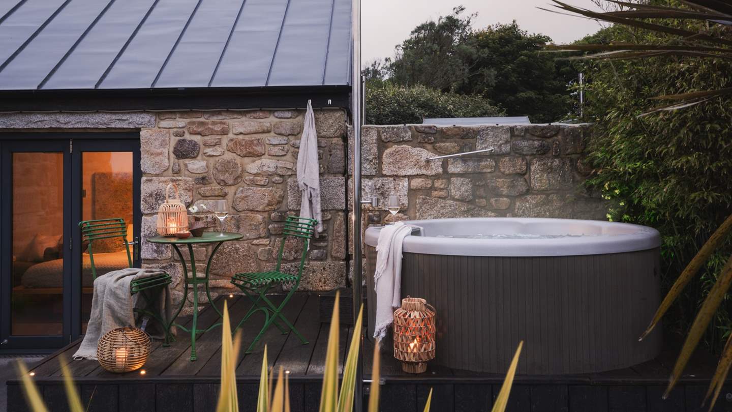 Watch the skies turn from day to dusk, sipping flutes of sparkle from the bubbling hot tub