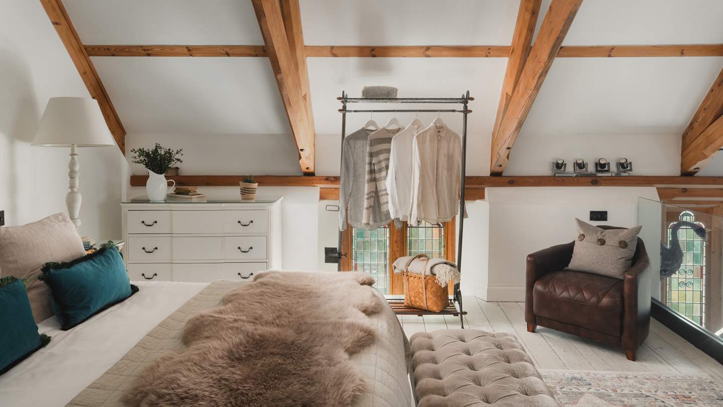 Light-filled and airy, with soft linens and cosy corners, the master bedroom is simply a delight