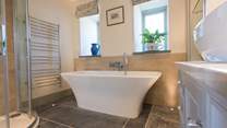 The family bathroom at Trevear Mill House with a bath made for long soaks