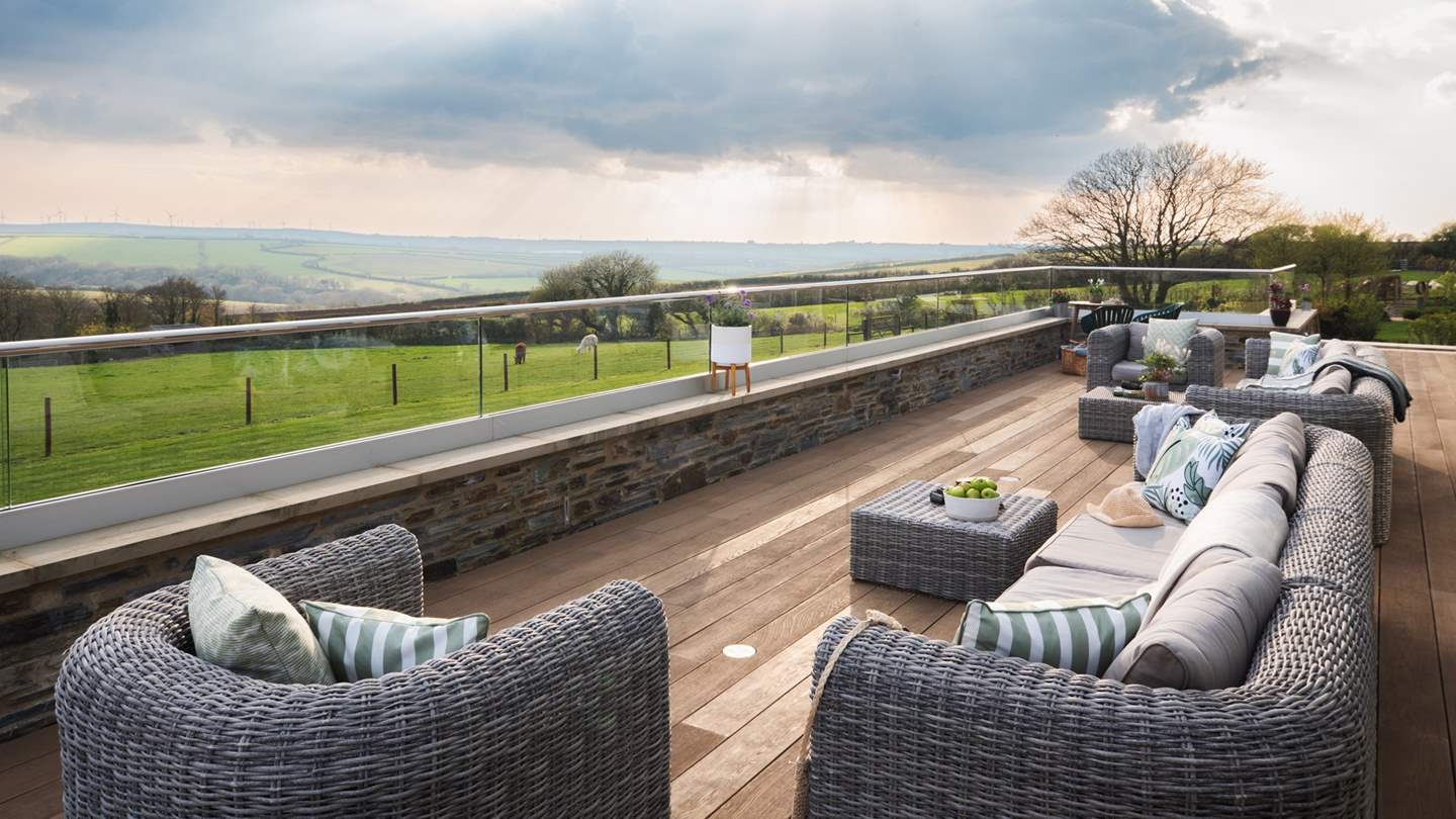 Lounge poolside or take decadent dips, before heading onto the decking area outside to savour far-reaching views across rolling countryside scenes