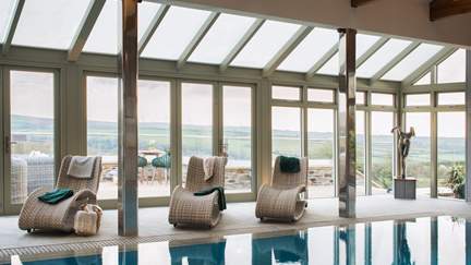 The stunning indoor heated pool is just gorgeous, with glass doors opening on to the huge sun deck