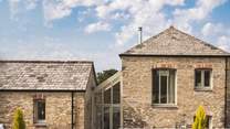 Trevear Mill House is an exquisitely finished luxury home, set within a courtyard of converted barns surrounded by seventy acres of arable farmland. Welcomes up to six guests.