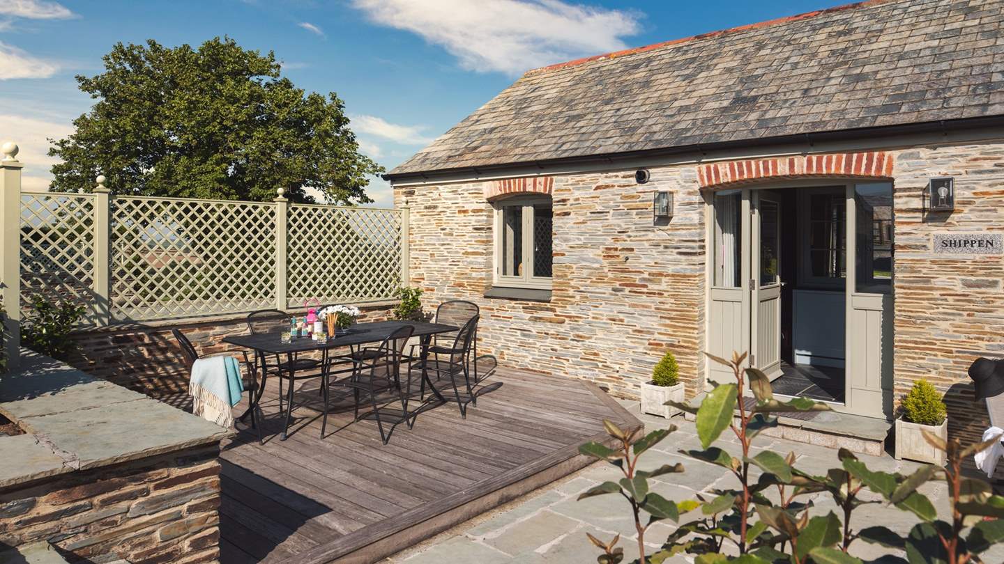 Alfresco eating is a cinch at Trevear Shippen, with plenty of seating around the outside table and a barbeque