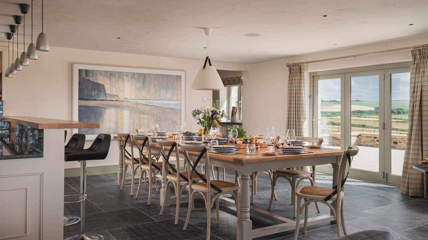 The bespoke, hand-crafted dining table is made locally from oak and is the perfect setting for celebration meals