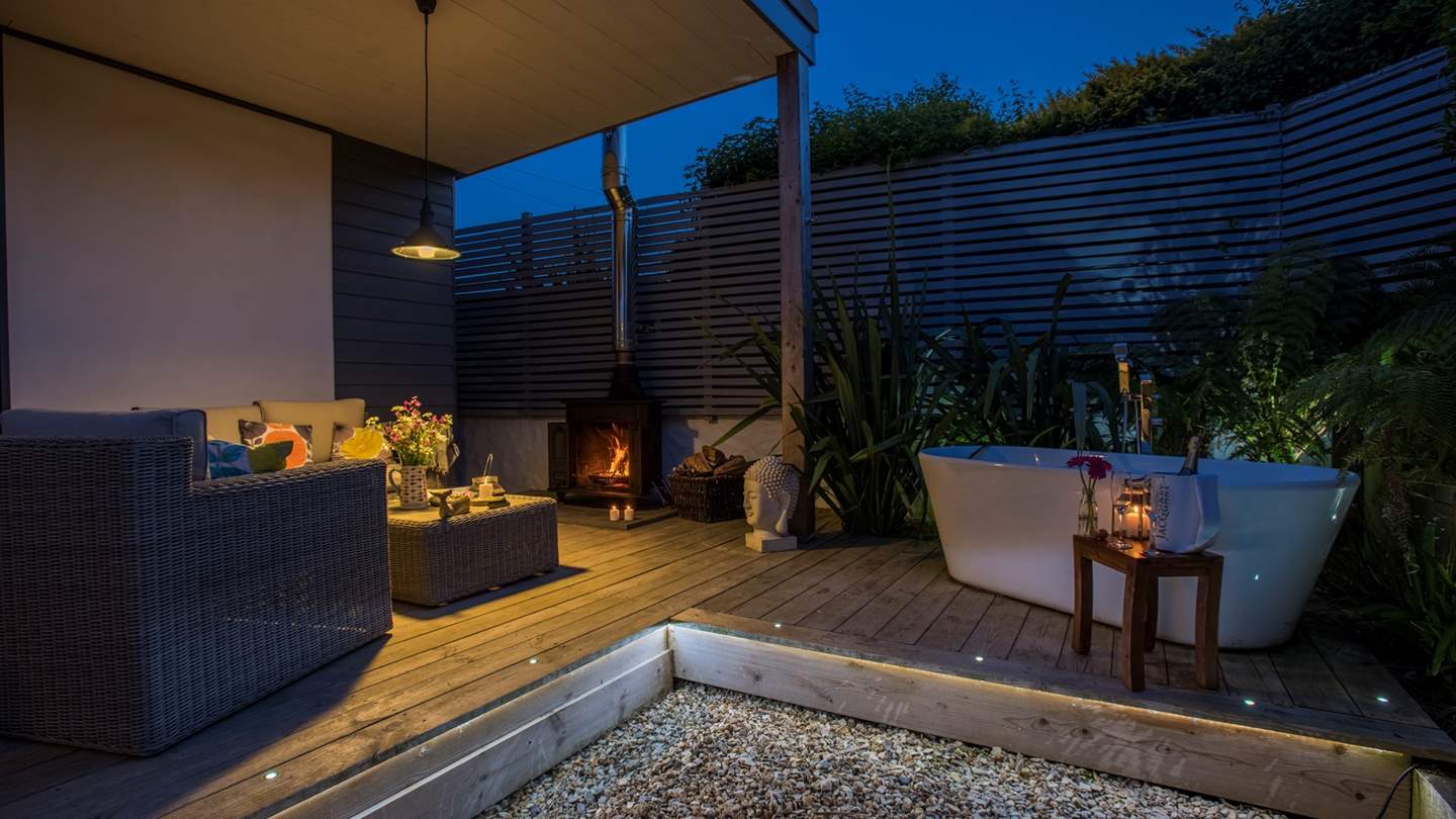 An alfresco wood burner plus an outdoor bath  - perfect for romantic evenings.