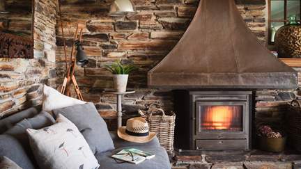 The roar of the wood burner is a welcome sight on cooler days - just dreamy