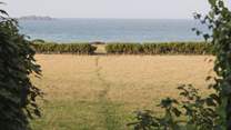 Right on your doorstep, a private pathway leads down to Harlyn Bay, a large, golden sand beach sheltered by Trevose Head