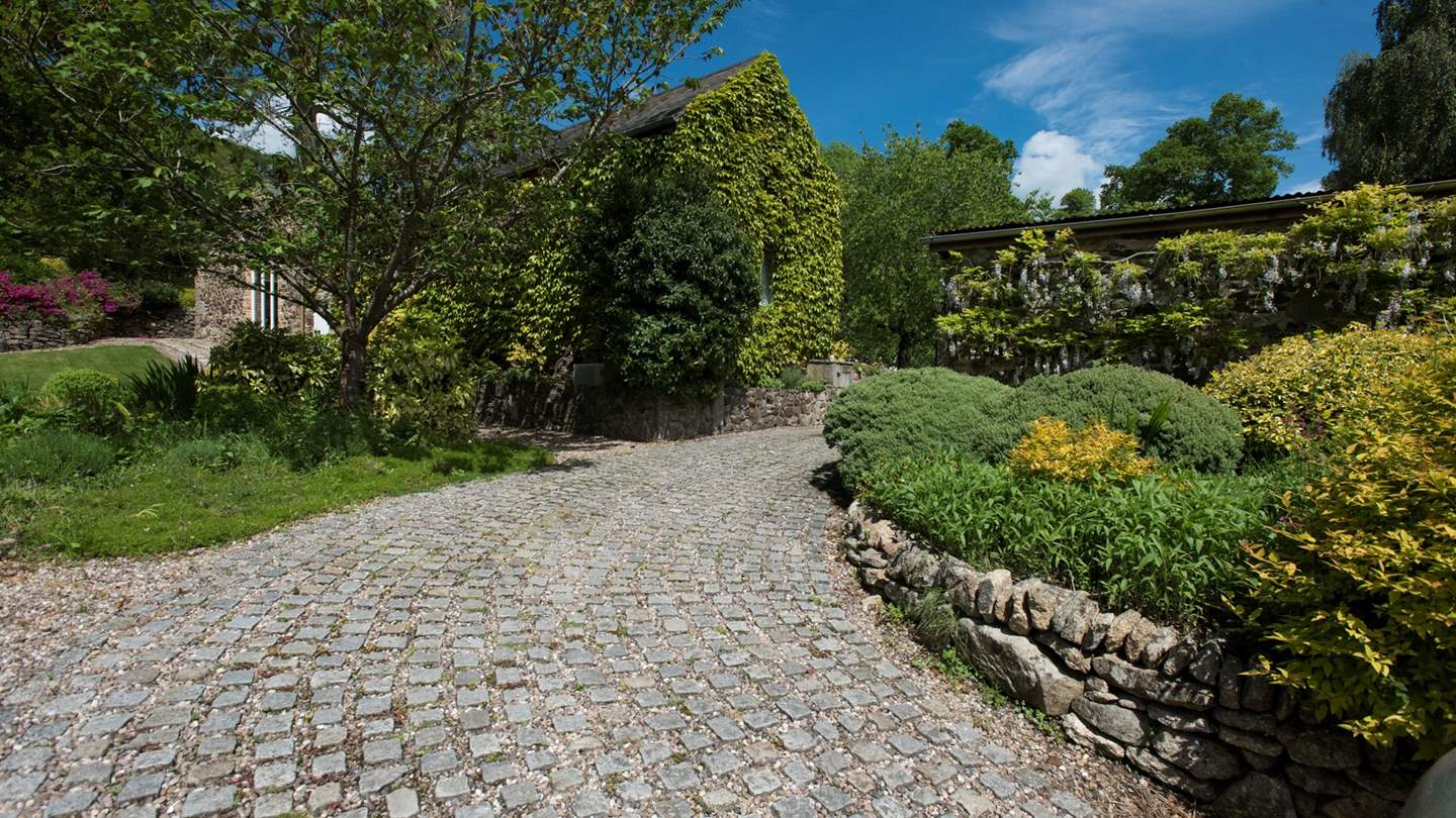 The large, extensive gardens are meticulously maintained.