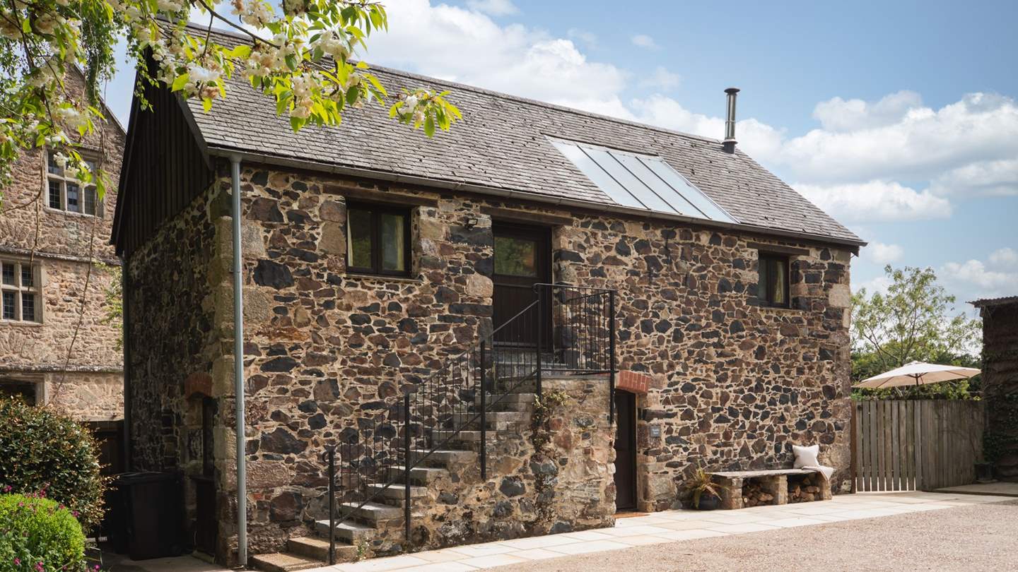 Set in pretty countryside, staying at Buddle Barn is like stepping back in time, being surrounded by beautifully converted barns within a large courtyard and incredible landscaped gardens in the most tranquil of settings