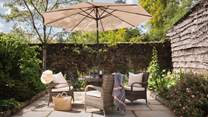 The courtyard garden, a former Potager (kitchen garden) is a private spot for alfresco meals.