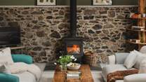 The cute wood-burning stove adds extra cosiness during cooler weather