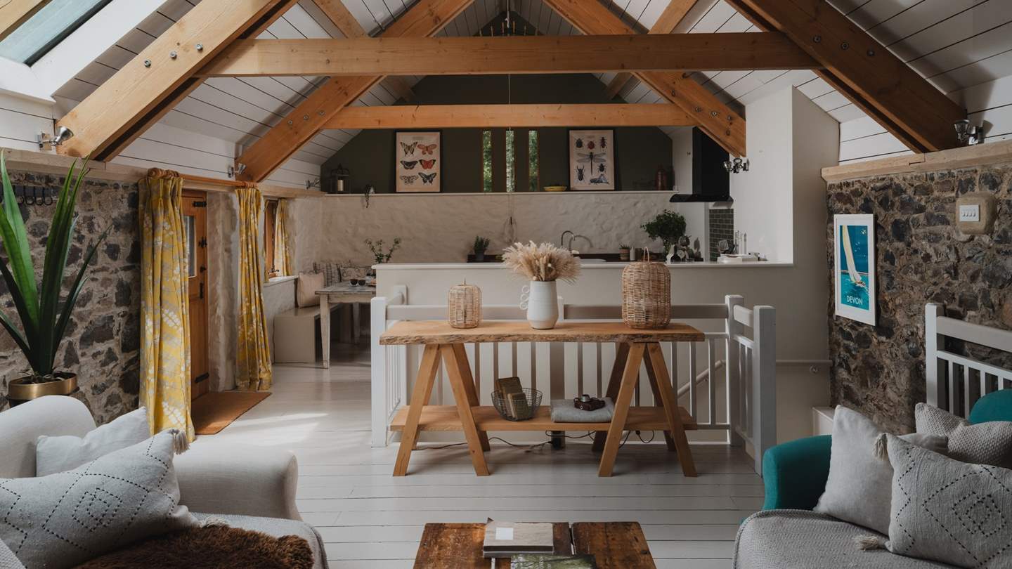 With an upside-down approach, the two bedrooms and bathroom are on the ground floor whilst the open-plan living, dining and kitchen area can be found upstairs