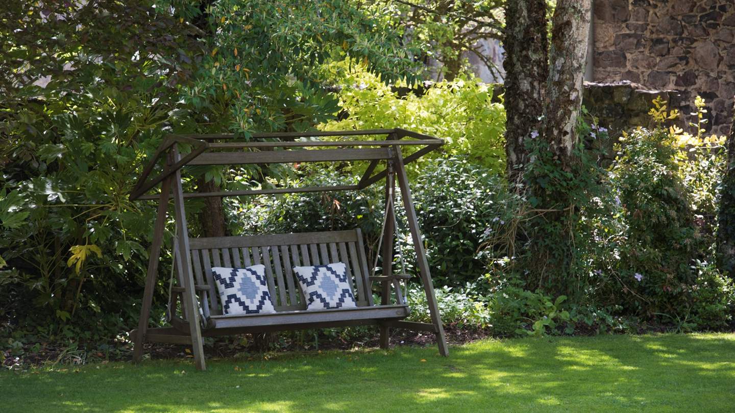 A cosy swing seat to lovingly watch the little ones play 