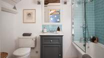 We love this spacious en suite with hints of duck-egg blue 
