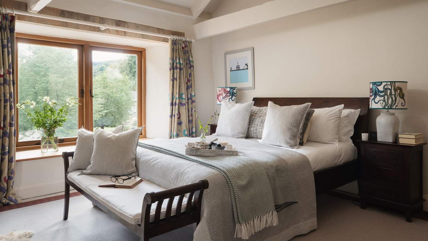 With a king-sized bed, en suite bathroom and a separate shower room
