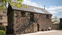 Step across the courtyard and you'll find Buddle Barn, a sweet staycation for four..