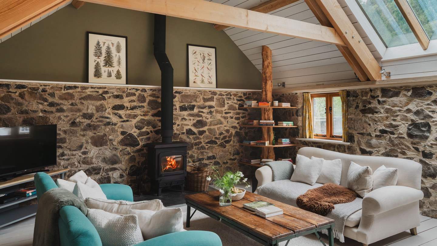 Two beautiful Loaf sofas, bedecked in cream and turquoise and draped in sheepskins and the softest of cushions