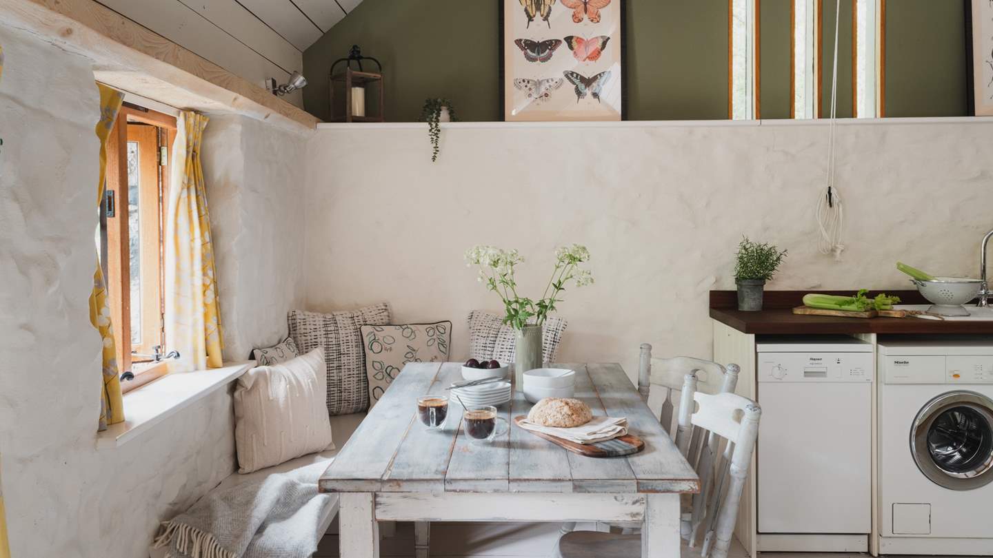 The dining table sits in the kitchen and seats six - perfect for long, leisurely meals

