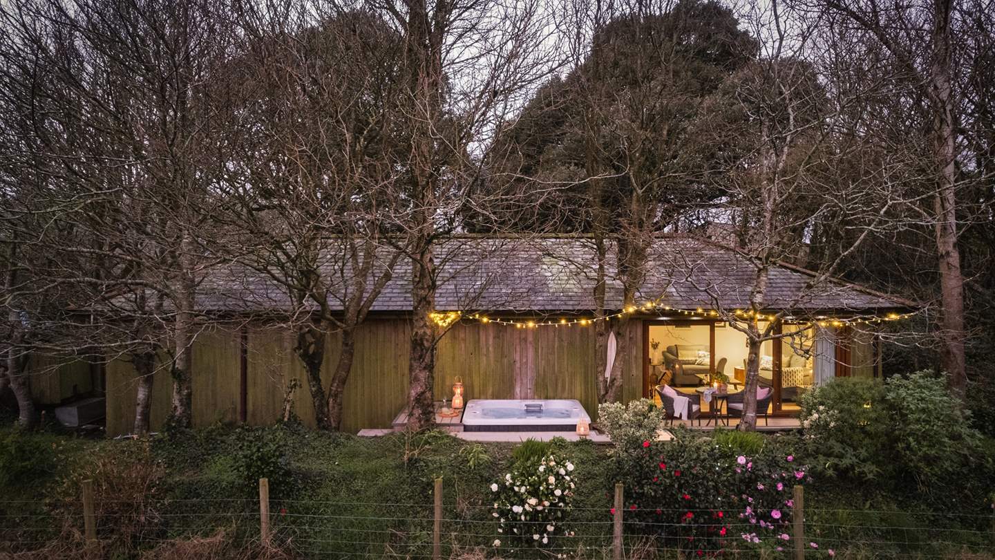 Take a few steps down from the decking and you'll find your own paddock - ideal for exercising your dog