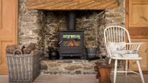 The traditional hearth harks back to forgotten times, whilst the wood burner provides a cosy glow - bliss!