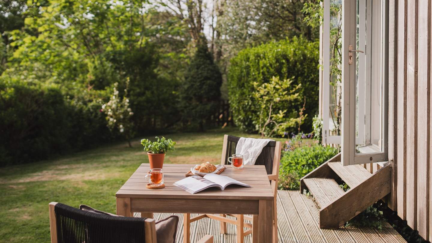 The sun-soaked deck is a perfect spot for whiling away a balmy afternoon