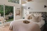 Blissful slumbers are promised in this pretty and tranquil en suite bedroom