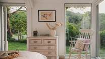 With floor to ceiling windows offering beautiful countryside views, our luxury retreat is perfect for lazy lie-ins where you can sit and watch the wildlife go by