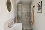 The en suite shower room has a large walk-in rainfall shower - perfect for those wake-me-up mornings or for warming yourself up after a long cliff top walk