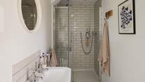 The en suite shower room has a large walk-in rainfall shower - perfect for those wake-me-up mornings or for warming yourself up after a long cliff top walk