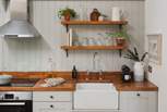 The kitchen is super-cute with everything you need to create a feast for your loved one