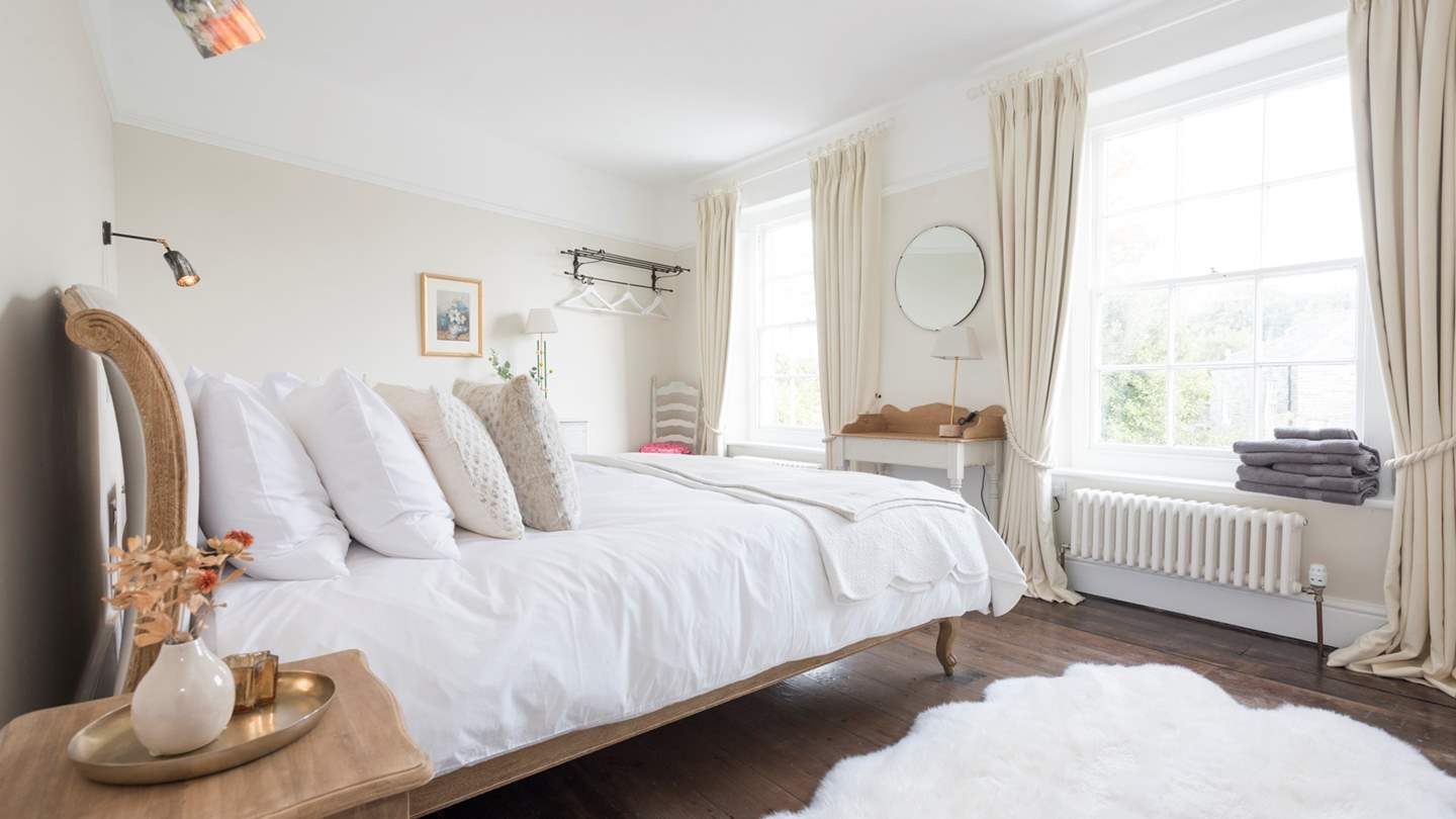 The master bedroom boasts a super king size, oh-so-comfy bed