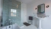 You can opt for a bubbling bath or a wake-me-up rinse under the huge walk-in shower - the choice is yours!
