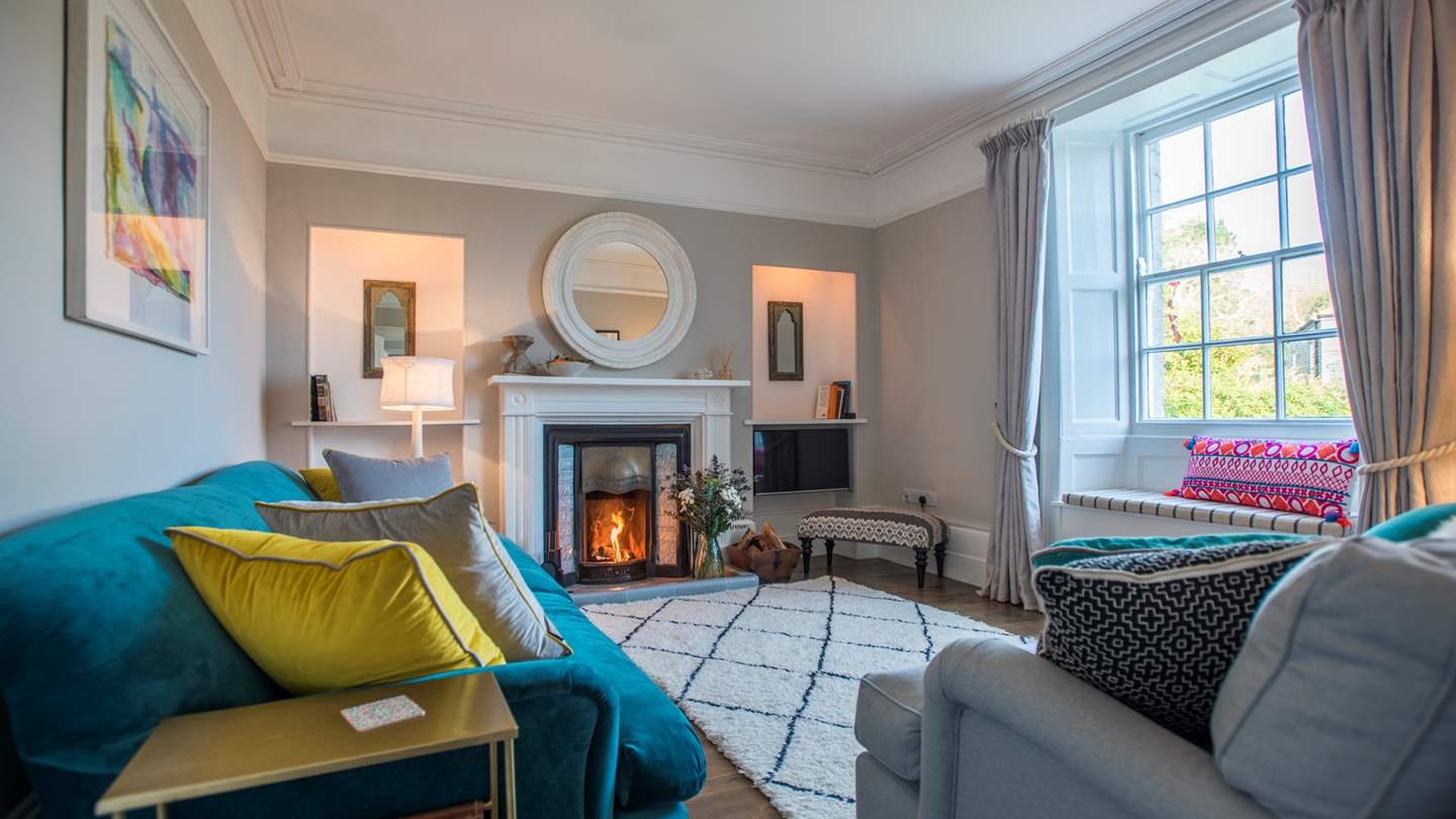 The two oversized, comfy Loaf sofas are just perfect whilst the garden views and mirrors all add a light, relaxed ambience