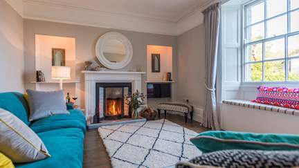 The stunning sitting room at Fentonluna with original fireplace