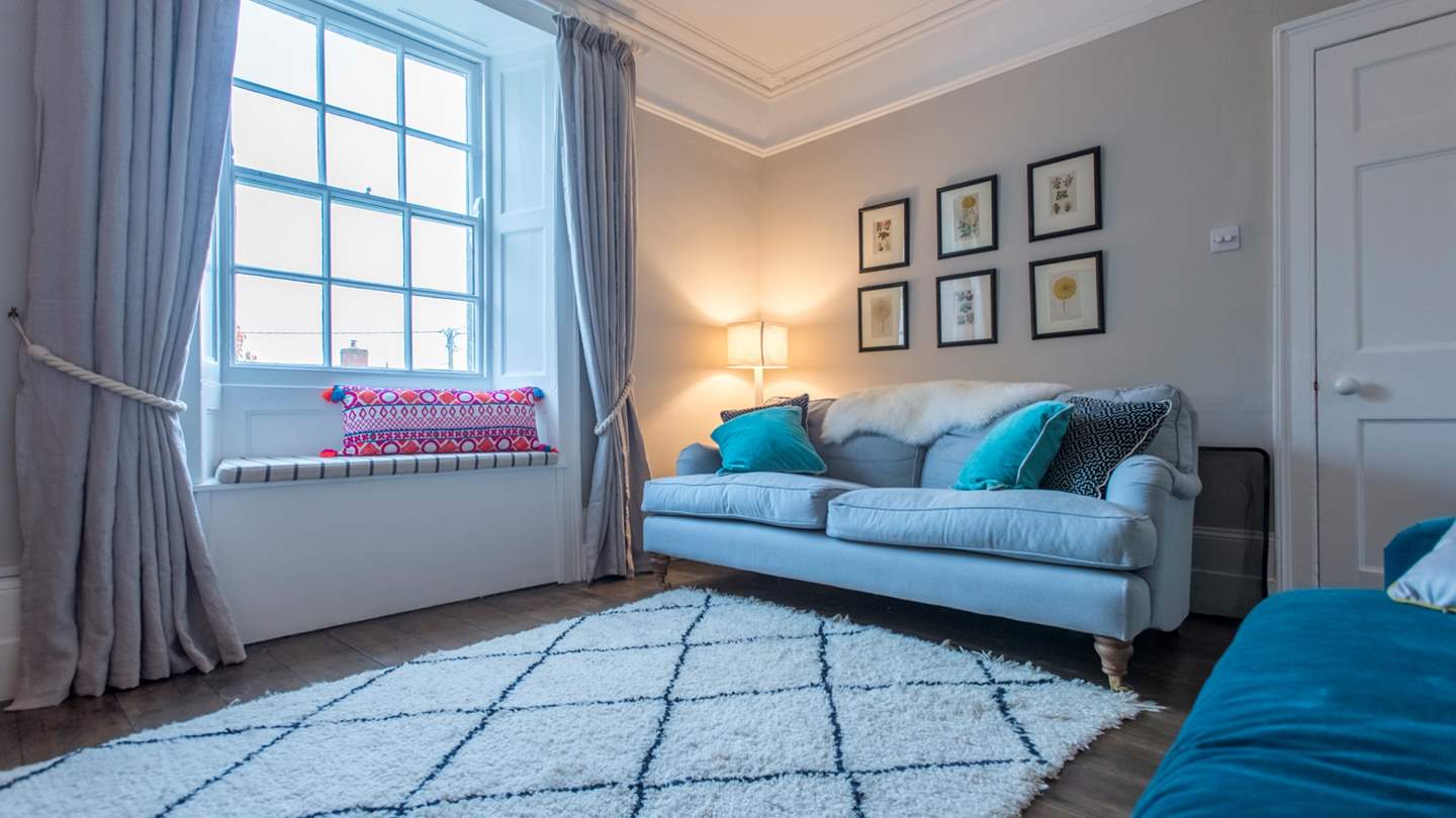 We love the original wooden floors but don't worry about chilly toes - a fab rug ensures feet are kept warm