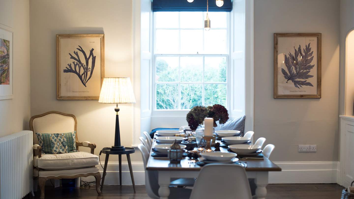 The open fire makes things super-cosy, the window overlooks the tranquil garden and the original exposed floorboards have been beautifully restored