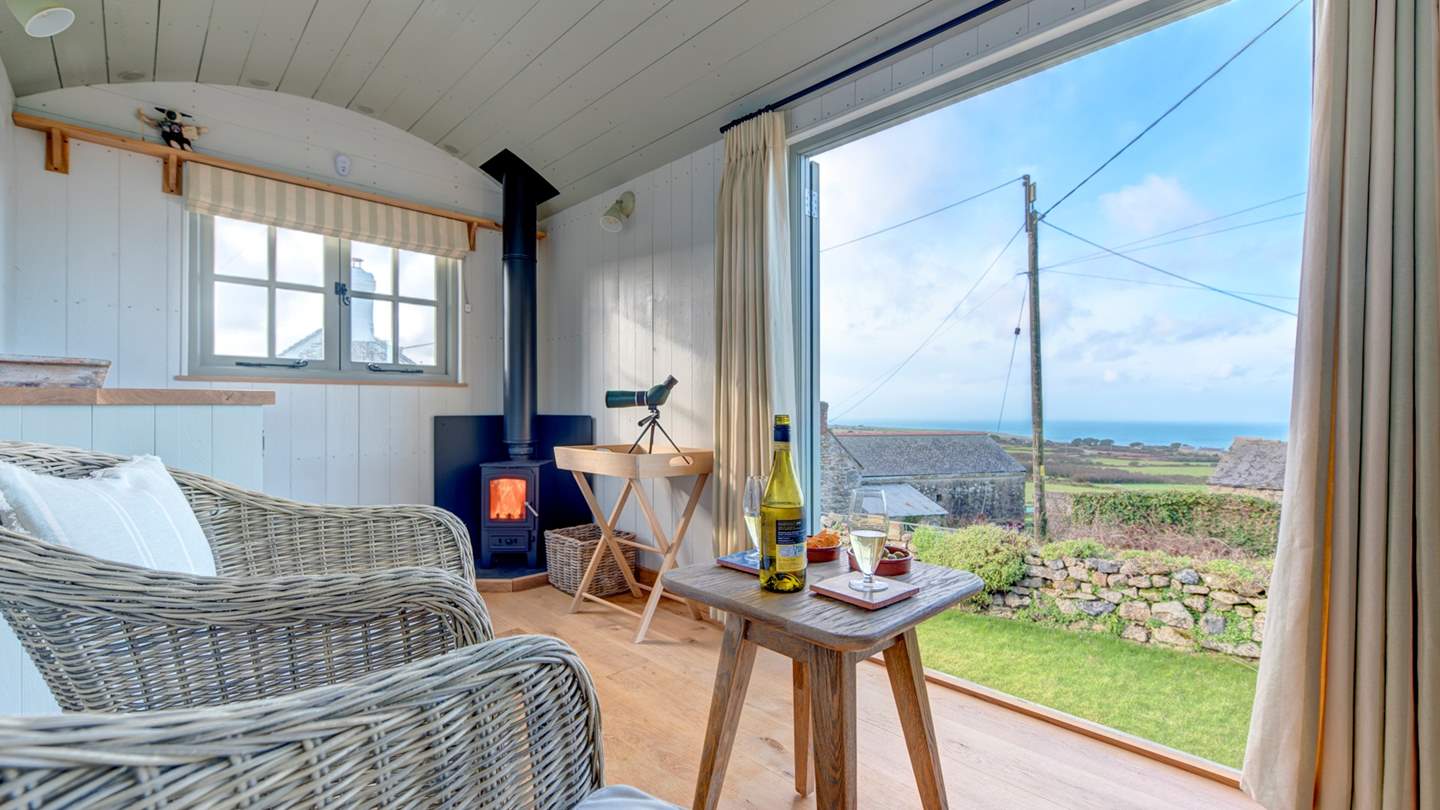 Make the most of the glorious sea views from the Shepherd's Hut in the garden! 