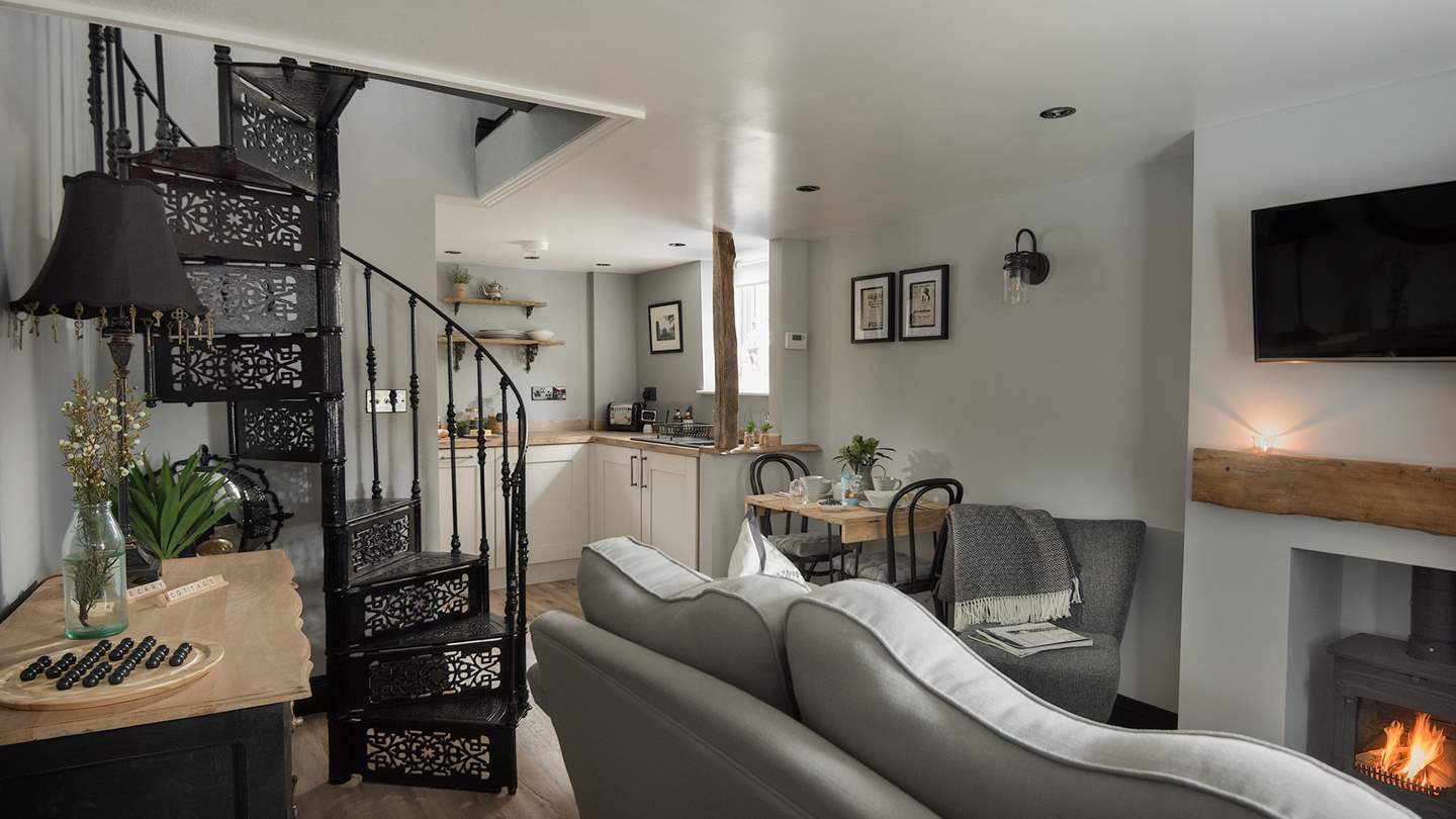 This bijoux cottage for two is cosy yet open plan in stunning shades of grey and black.