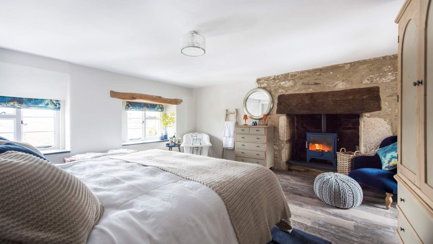 The incredible en suite master bedroom has a sumptuous Loaf super king bed as well as a fabulously romantic freestanding slipper-style bath and even a wood burning stove.