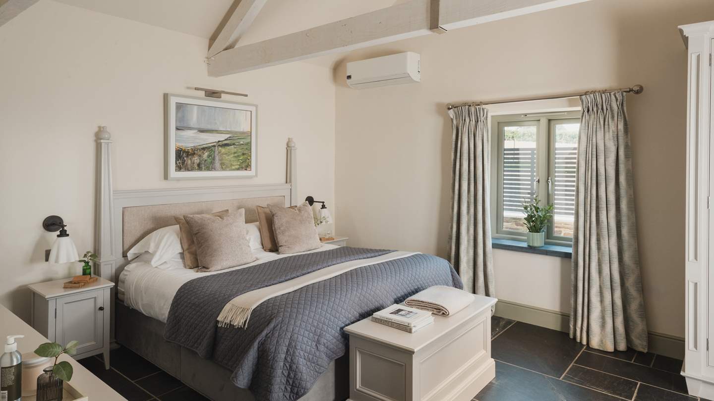 The master bedroom is a dream, thoughtfully decorated in calming hues